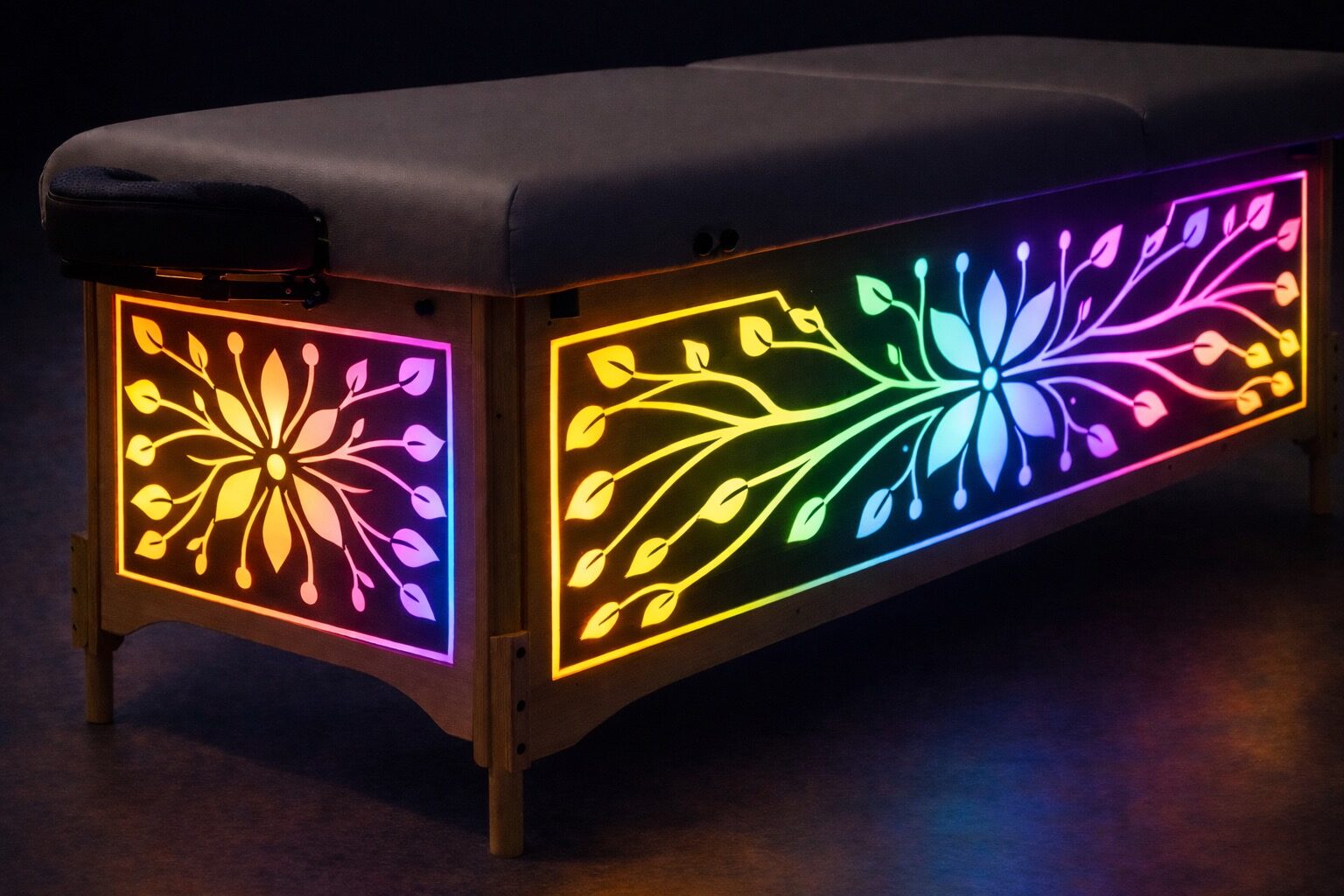 Close-up of the illuminated circuit-pattern woodwork on the side of the Vibro Vessel